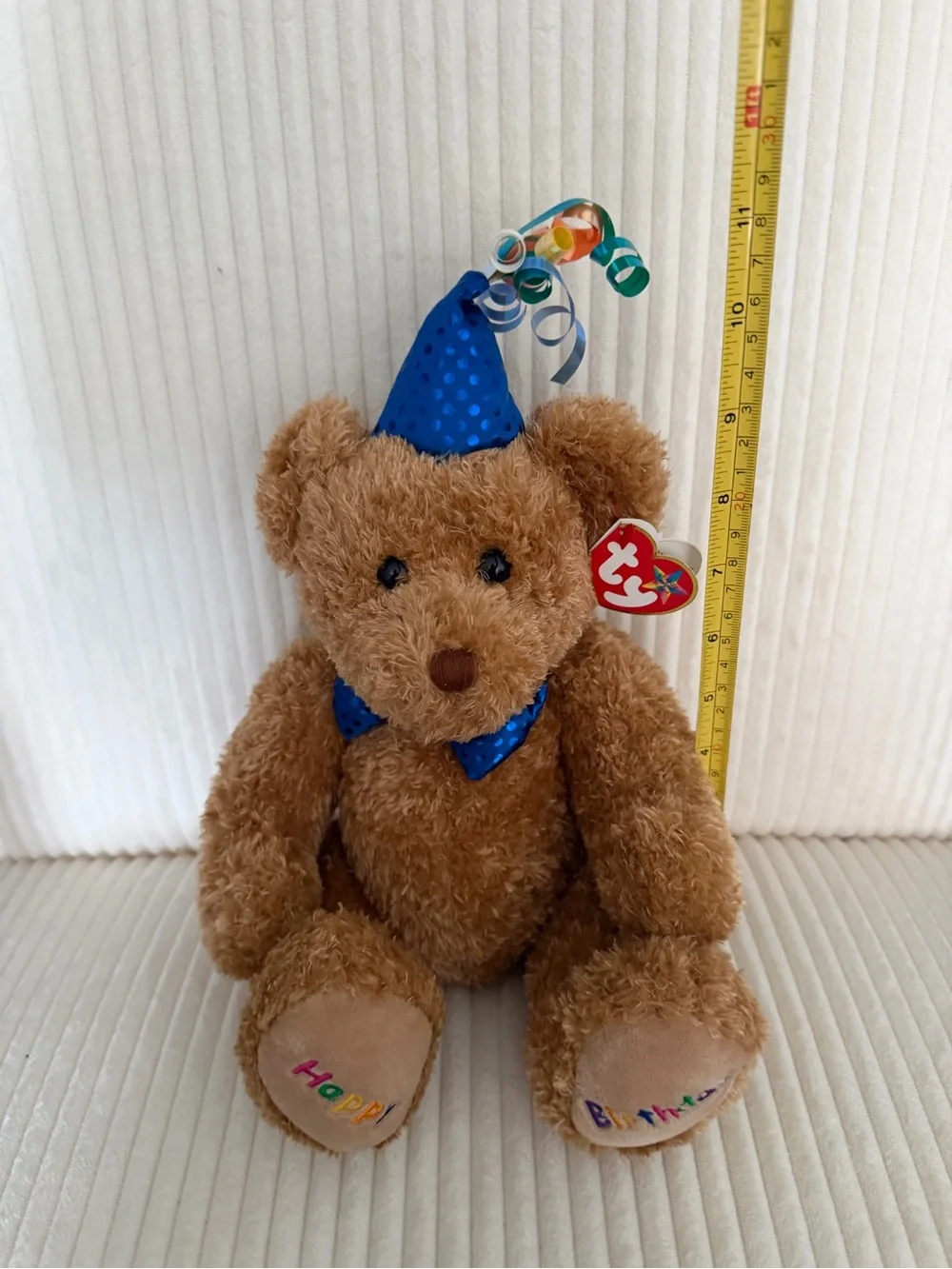 Kids plush toy with birthday hat
